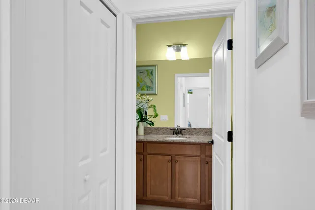 a aerial view of a house with a yard