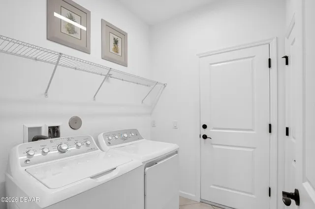 an aerial view of house with yard swimming pool and ocean view