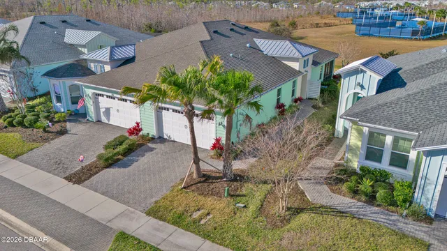 a view of a swimming pool with a yard