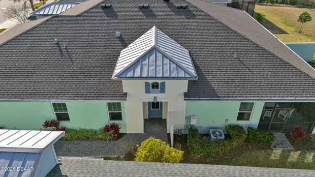 a view of a chairs and table in the patio