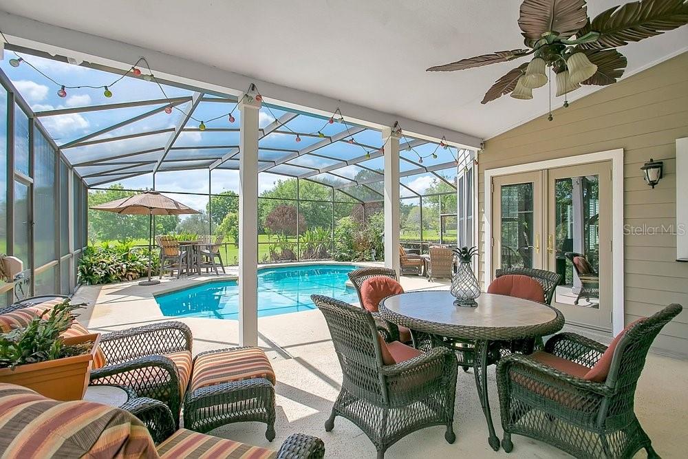 2702 Carter Grove Circle Windermere, FL 34786 - Photo 27 of 42 a view of a dining room with furniture window and outside view