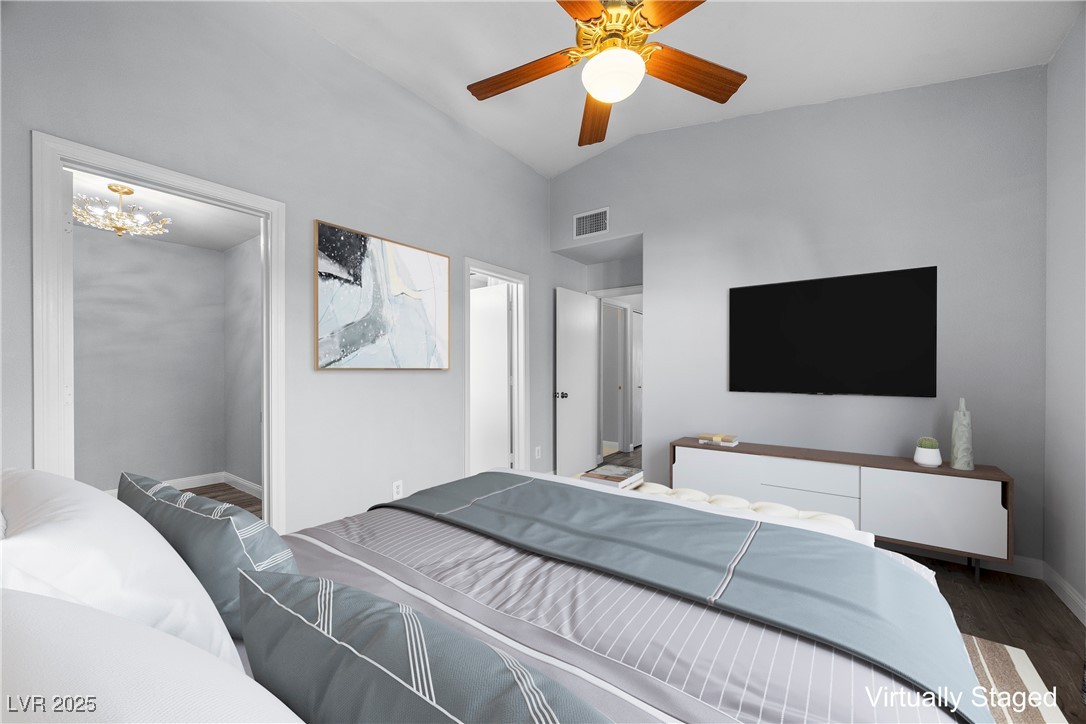 2152 Quarry Ridge Street, Unit 207 Las Vegas, NV 89117 - Photo 17 of 37 "Virtually Staged" Bedroom featuring vaulted ceiling, dark wood-type flooring, and ceiling fan