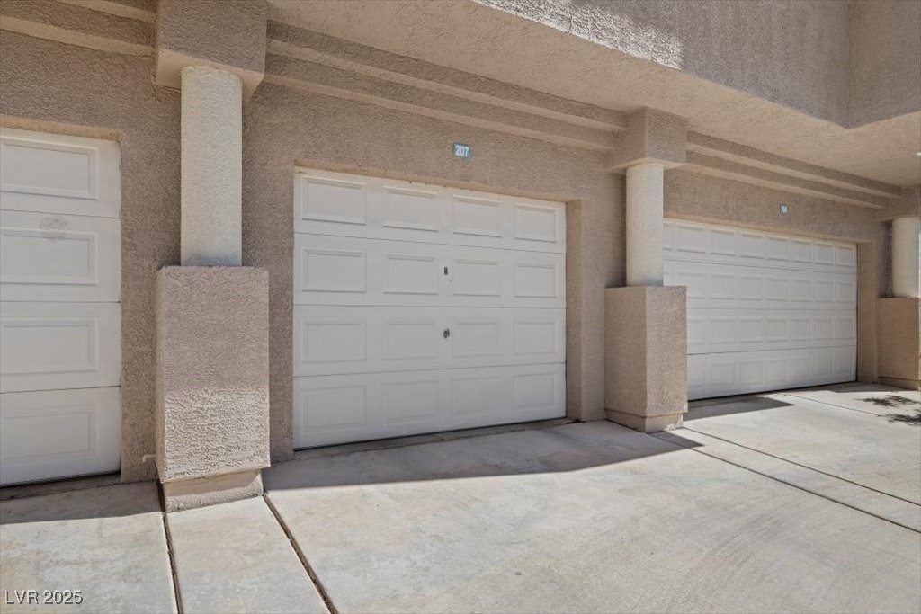2152 Quarry Ridge Street, Unit 207 Las Vegas, NV 89117 - Photo 2 of 37 View of garage
