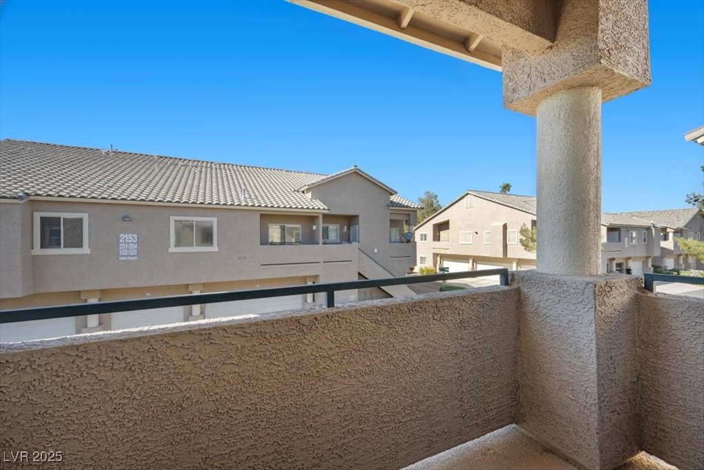 2152 Quarry Ridge Street, Unit 207 Las Vegas, NV 89117 - Photo 20 of 37 Balcony with a residential view