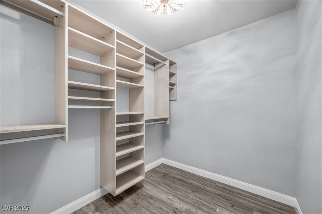 2152 Quarry Ridge Street, Unit 207 Las Vegas, NV 89117 - Photo 22 of 37 Spacious closet with light wood-style flooring