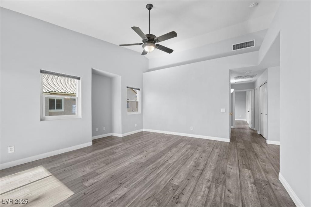 2152 Quarry Ridge Street, Unit 207 Las Vegas, NV 89117 - Photo 6 of 37 Living area with wood-style flooring and a ceiling fan