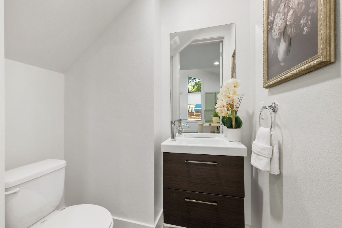 1118 Algarita Avenue, Unit 1 Austin, TX 78704 - Photo 20 of 26 a bathroom with a sink and a toilet