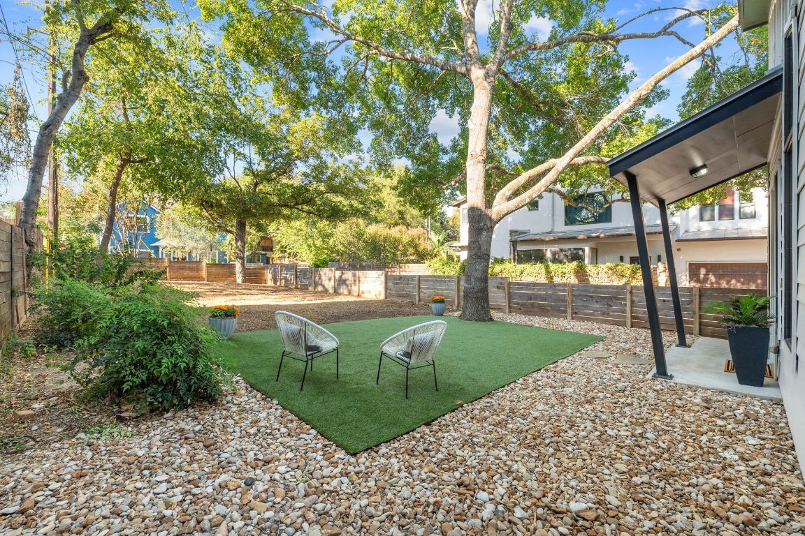 1118 Algarita Avenue, Unit 1 Austin, TX 78704 - Photo 3 of 26 a view of a garden with large trees