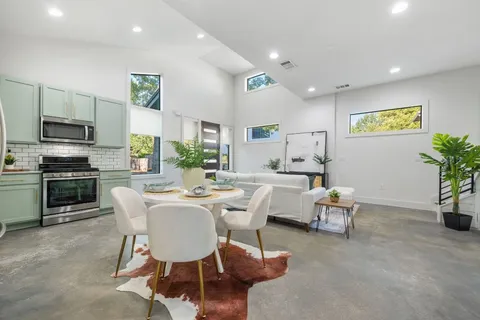a view of a dining room with furniture