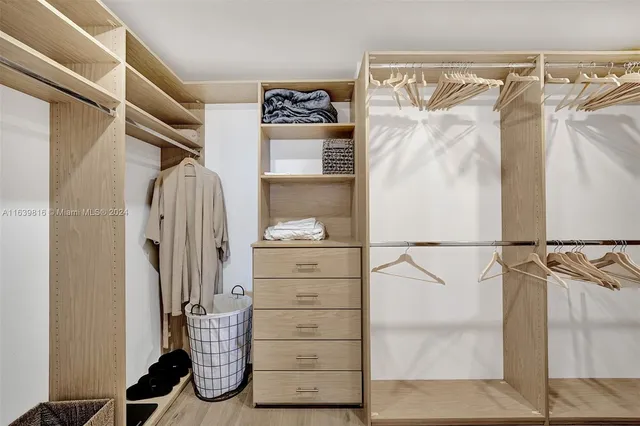 a view of a staircase and storage