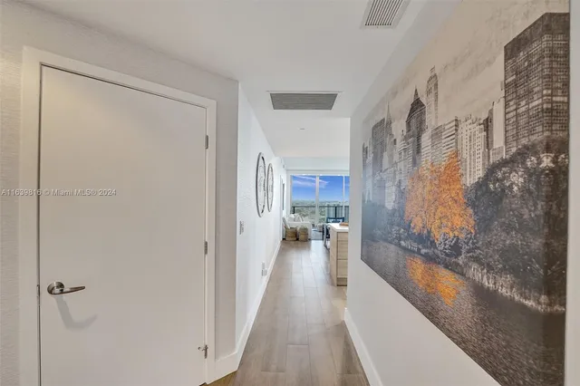 a kitchen with a sink stove and wooden cabinets
