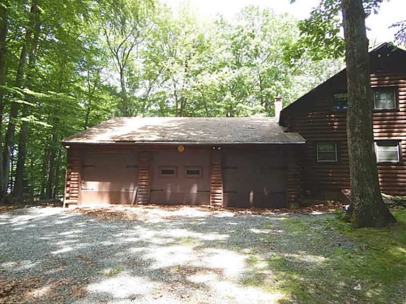 89 Pine Ledge Road, Unit 89 Glocester, RI 02857 - Photo 3 of 8 Exterior Front. 3 car garage