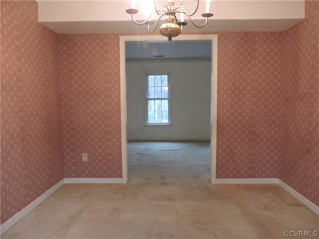 5810 Mill Spring Road Midlothian, VA 23112 - Photo 11 of 23 a view of an empty room with a window