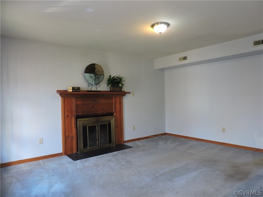 5810 Mill Spring Road Midlothian, VA 23112 - Photo 13 of 23 a view of an empty room with a fireplace