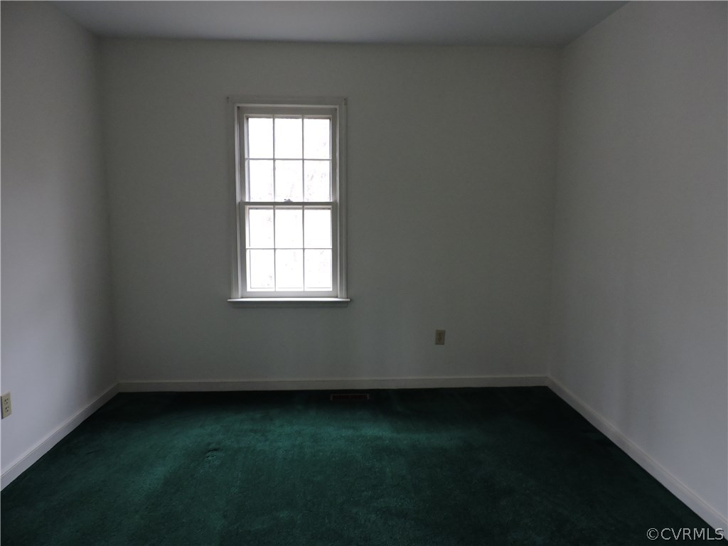 5810 Mill Spring Road Midlothian, VA 23112 - Photo 18 of 23 an empty room with a window