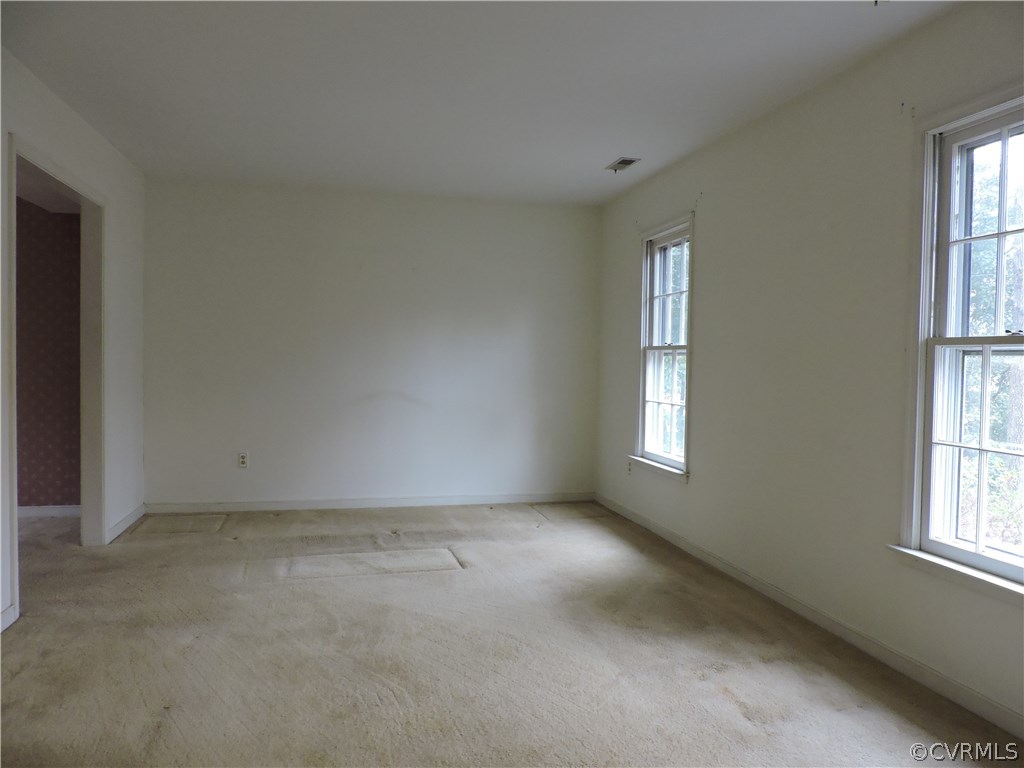 5810 Mill Spring Road Midlothian, VA 23112 - Photo 9 of 23 an empty room with windows