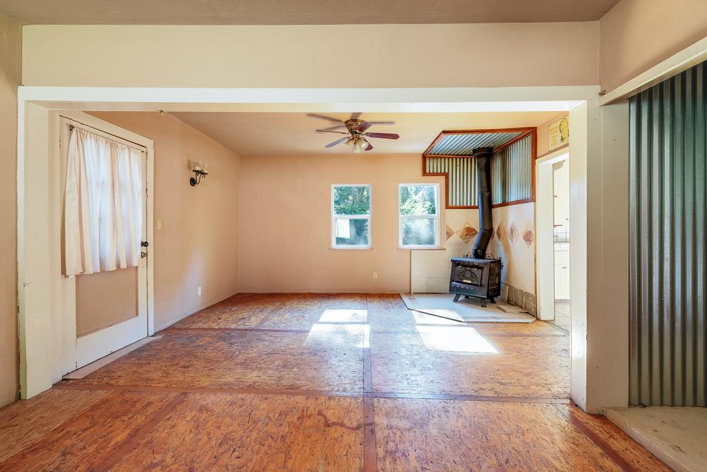 900 Mesa Grande Road Aptos, CA 95003 - Photo 15 of 30 a view of a livingroom with a ceiling fan and window