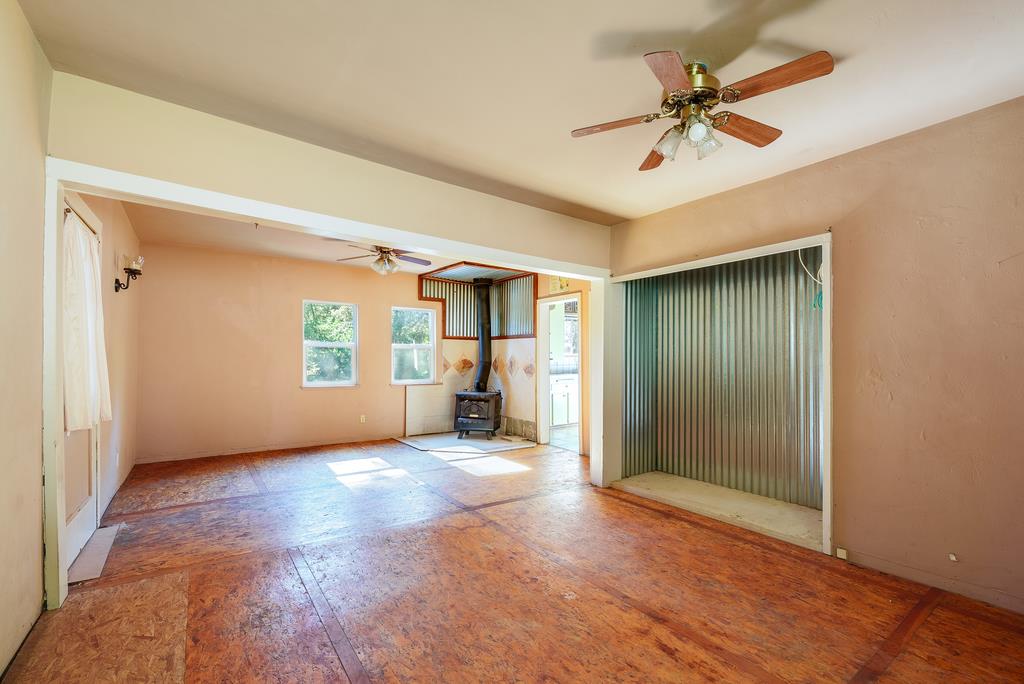 900 Mesa Grande Road Aptos, CA 95003 - Photo 17 of 30 wooden floor in an empty room with a window