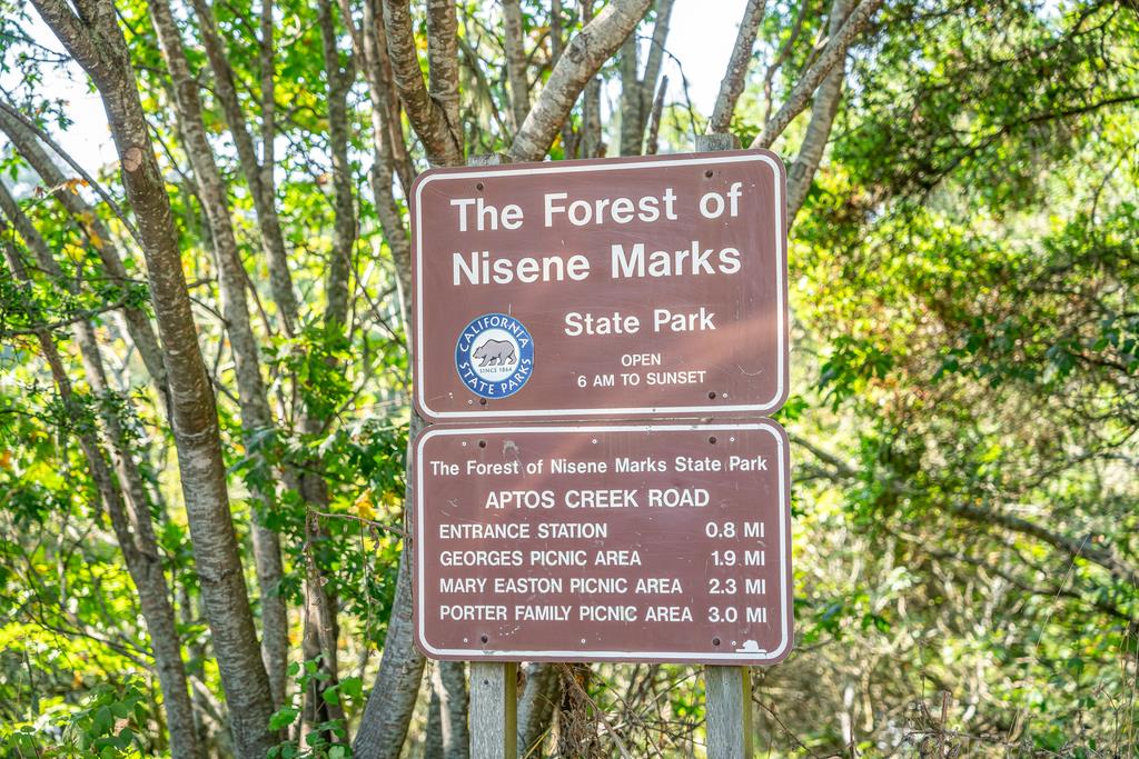 900 Mesa Grande Road Aptos, CA 95003 - Photo 9 of 30 a sign that is sitting on a wooden wall