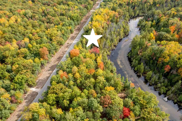 $397,500 | West Plum Valley Road Northwest, Rapid City, MI 49676