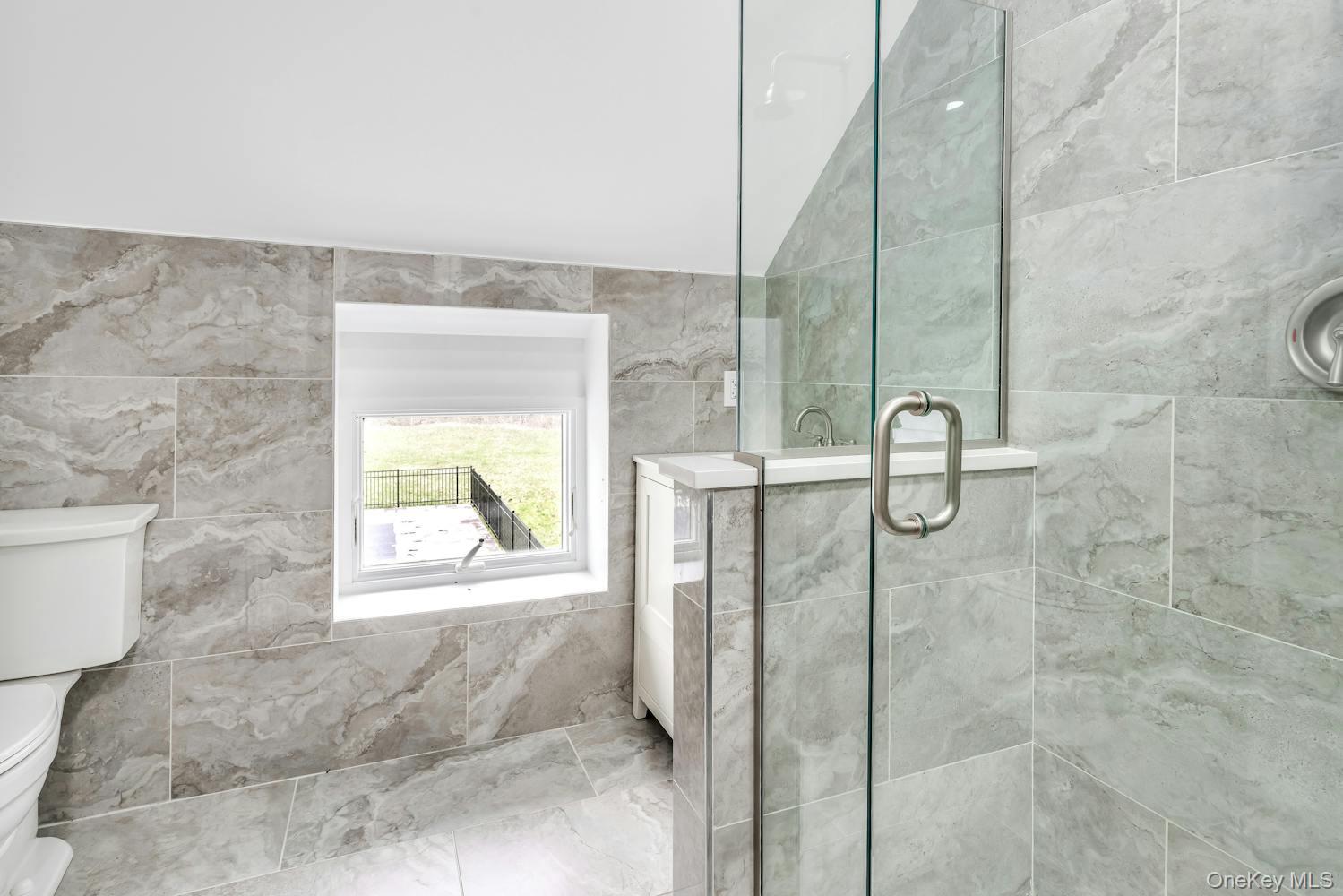 539 Split Rock Road Syosset, NY 11791 - Photo 29 of 40 Full bath featuring toilet and a shower stall