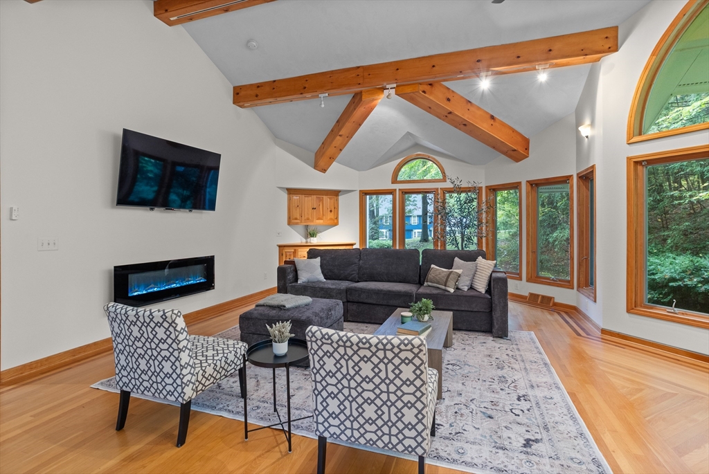 35 Oxbow Lane Groton, MA 01450 - Photo 19 of 34 a living room with furniture and a fireplace