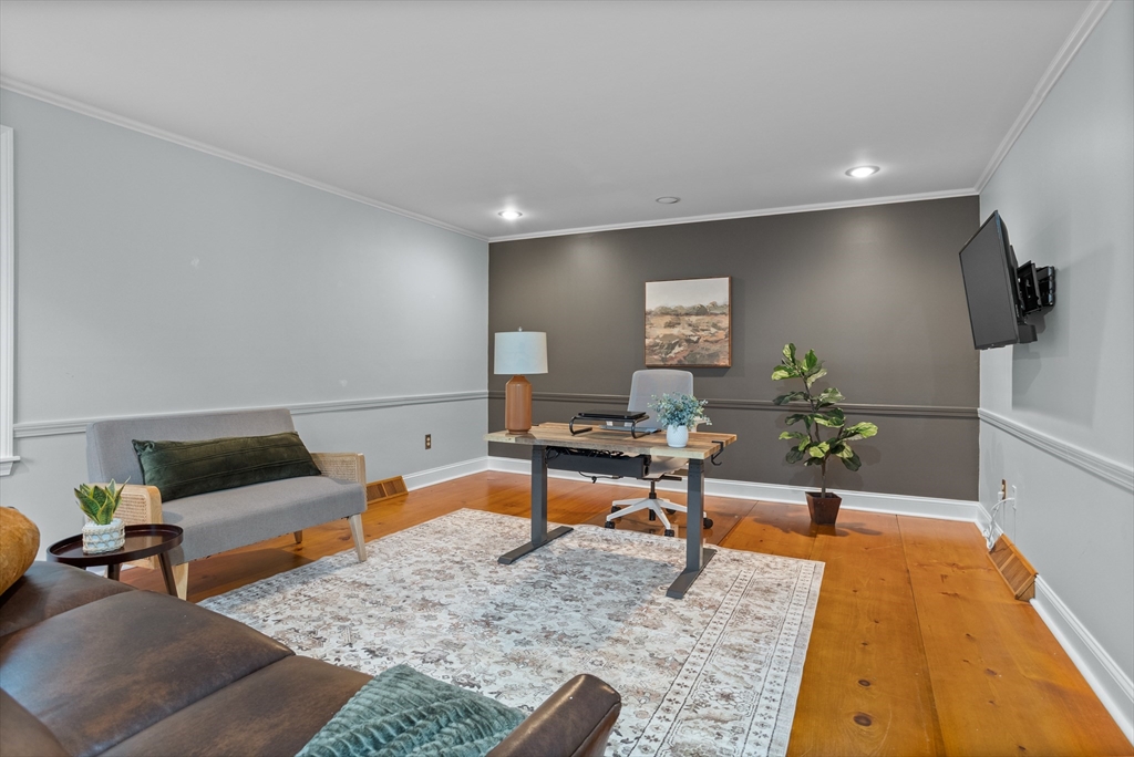 35 Oxbow Lane Groton, MA 01450 - Photo 22 of 34 a living room with furniture and a rug
