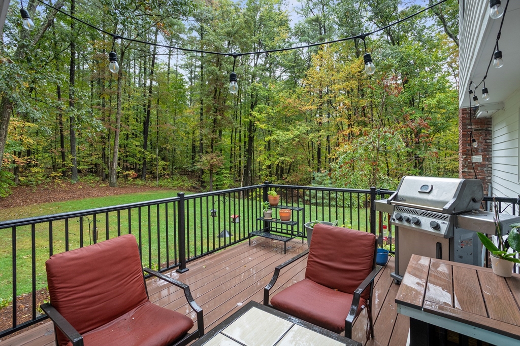 35 Oxbow Lane Groton, MA 01450 - Photo 6 of 34 a view of a two chairs in the deck
