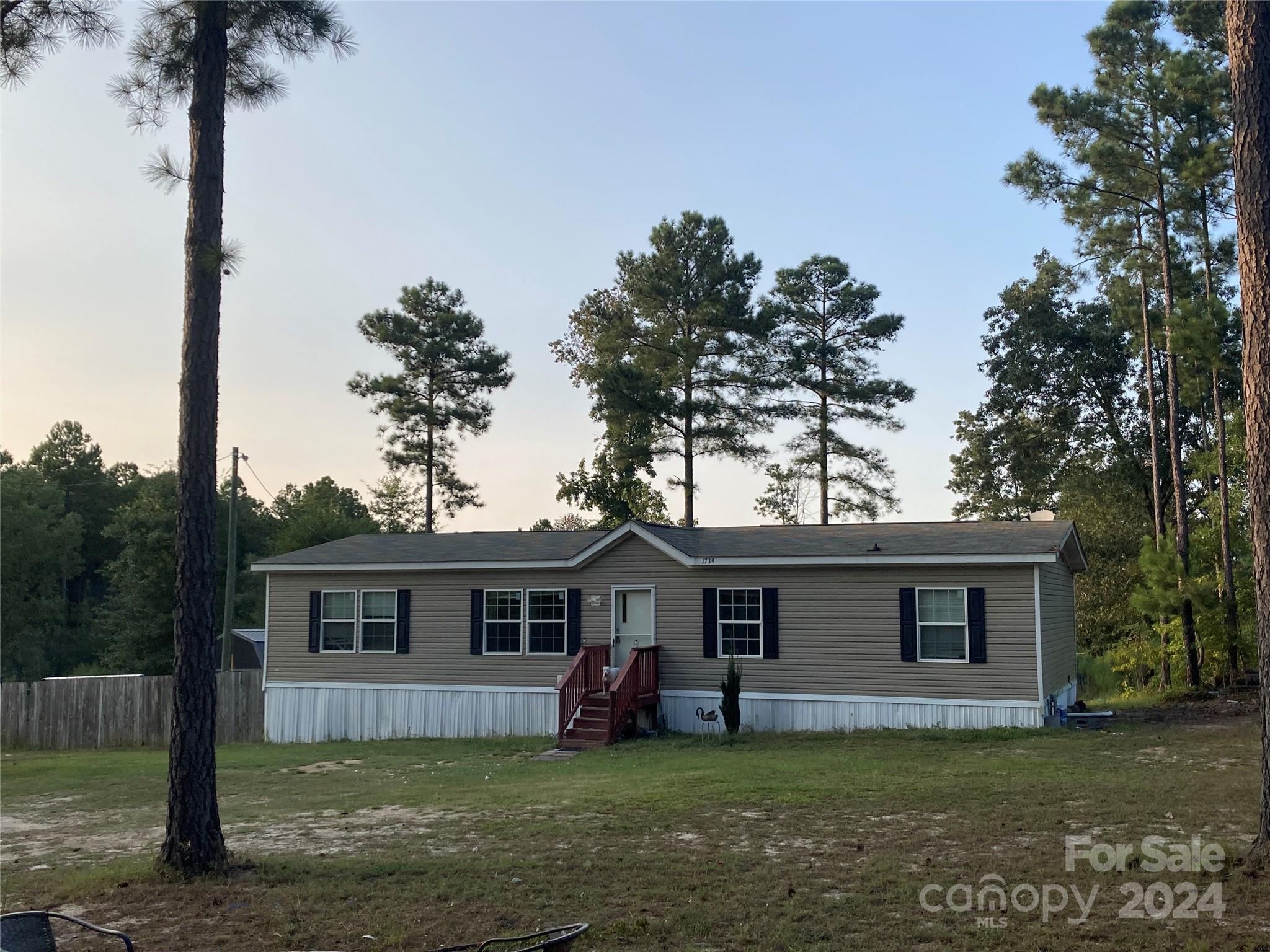 1739 Mary D Road, Unit 10 Chesterfield, SC 29709 - Photo 1 of 5 a view of a house with a yard