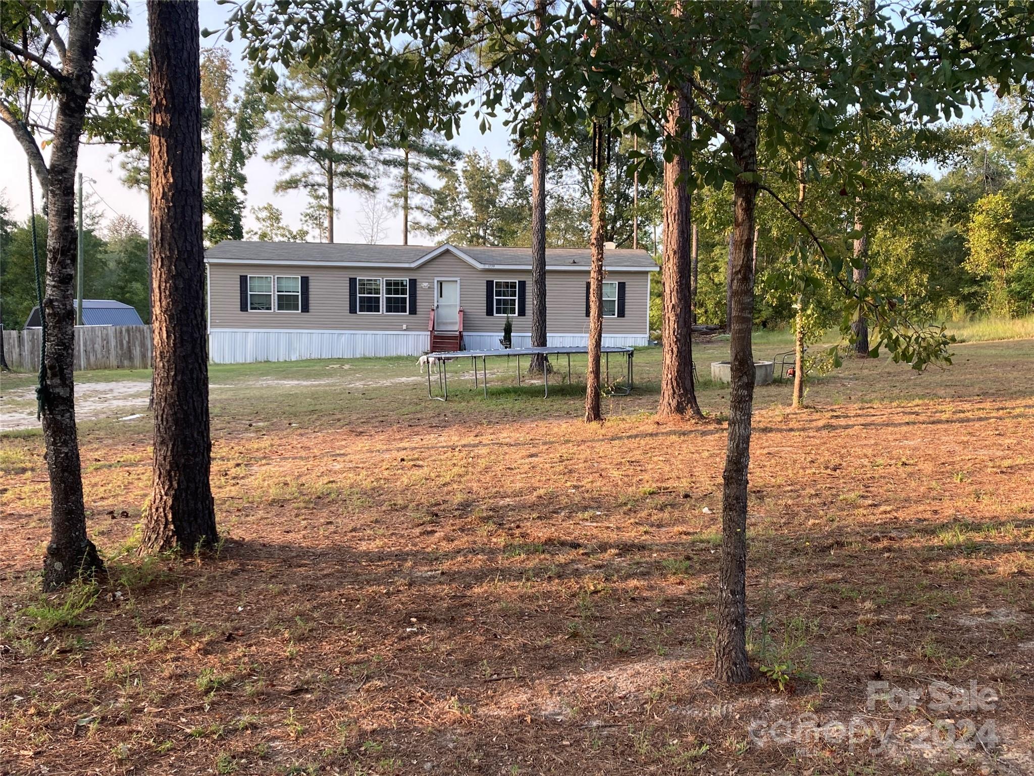 1739 Mary D Road, Unit 10 Chesterfield, SC 29709 - Photo 5 of 5 a view of a house with a yard