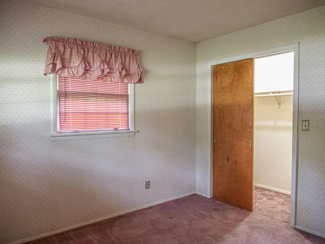 an empty room with a window