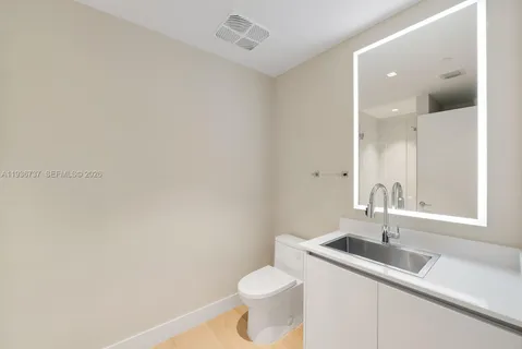 a bathroom with a sink and a toilet