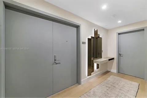 a bathroom with a sink and shower