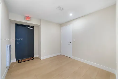 a view of a room with an empty space