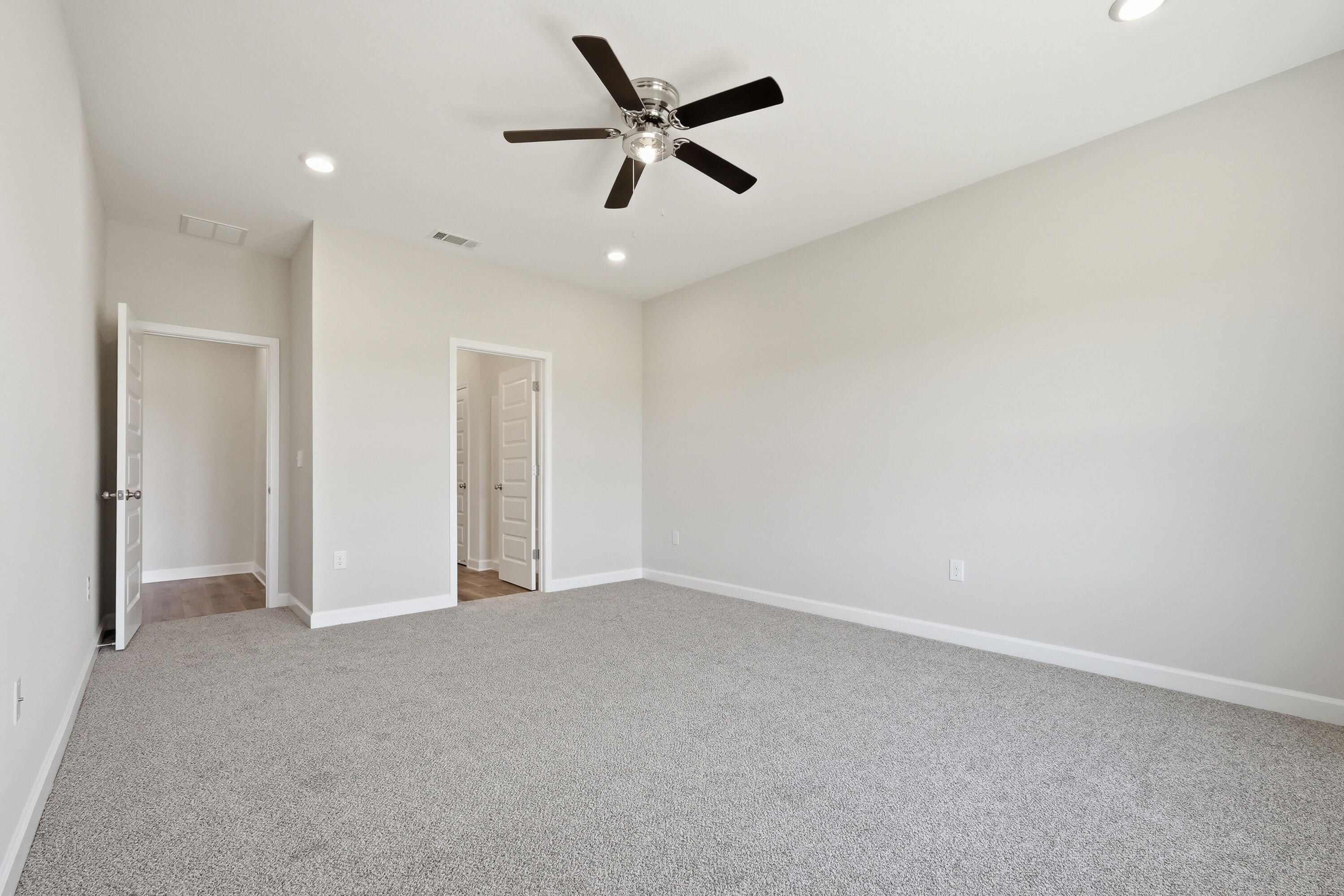 6114 Mildreds Way Crestview, FL 32539 - Photo 15 of 24 an empty room with closet and a ceiling fan