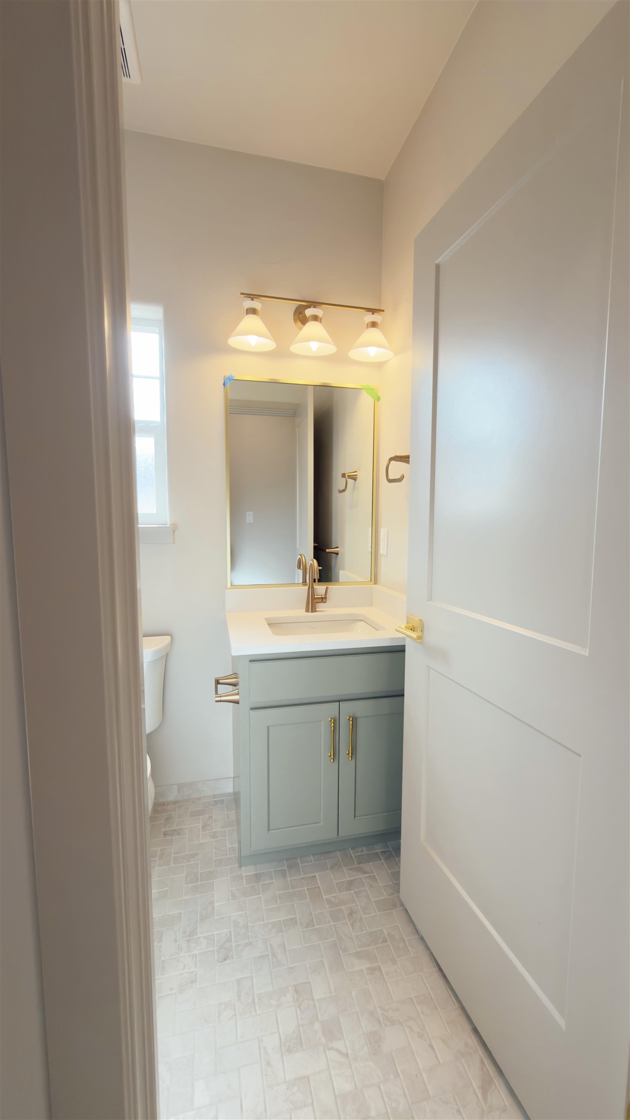 2003 Korima Drive Fruita, CO 81521 - Photo 14 of 19 a bathroom with a sink a toilet and mirror