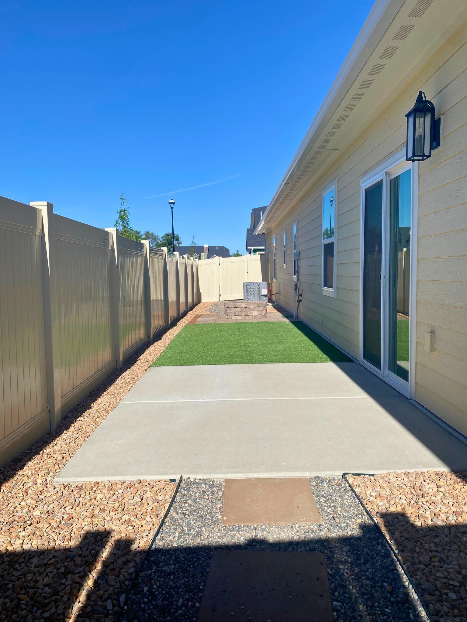 2003 Korima Drive Fruita, CO 81521 - Photo 3 of 19 a view of backyard with roof and wooden fence