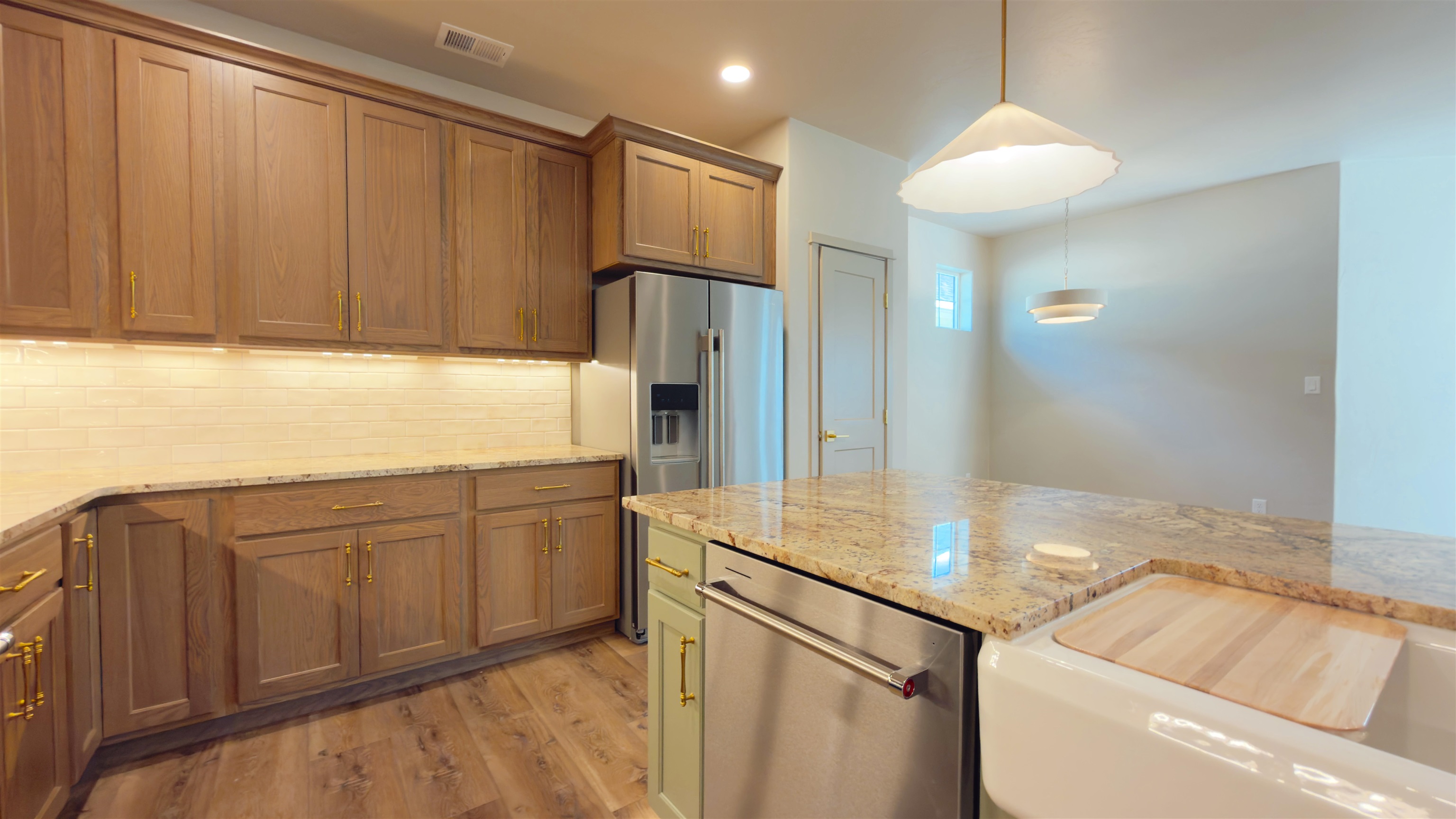 2003 Korima Drive Fruita, CO 81521 - Photo 7 of 19 a kitchen with stainless steel appliances granite countertop a refrigerator and a sink