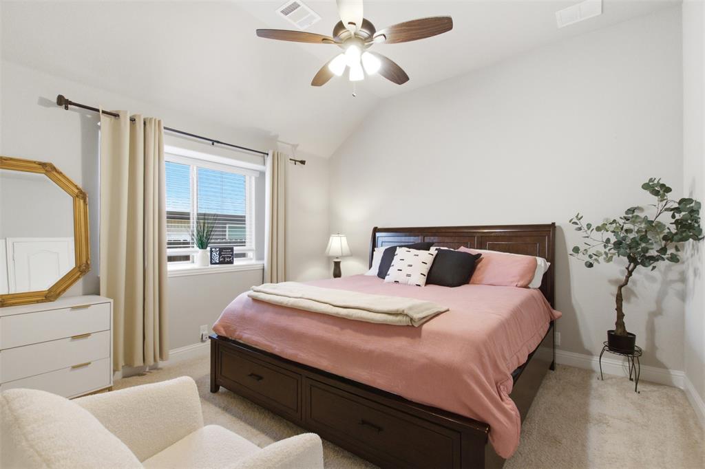 540 Ramon Street Burleson, TX 76028 - Photo 21 of 26 Large secondary bedroom provides the flexibility to be used as a game room, home office, or guest room.