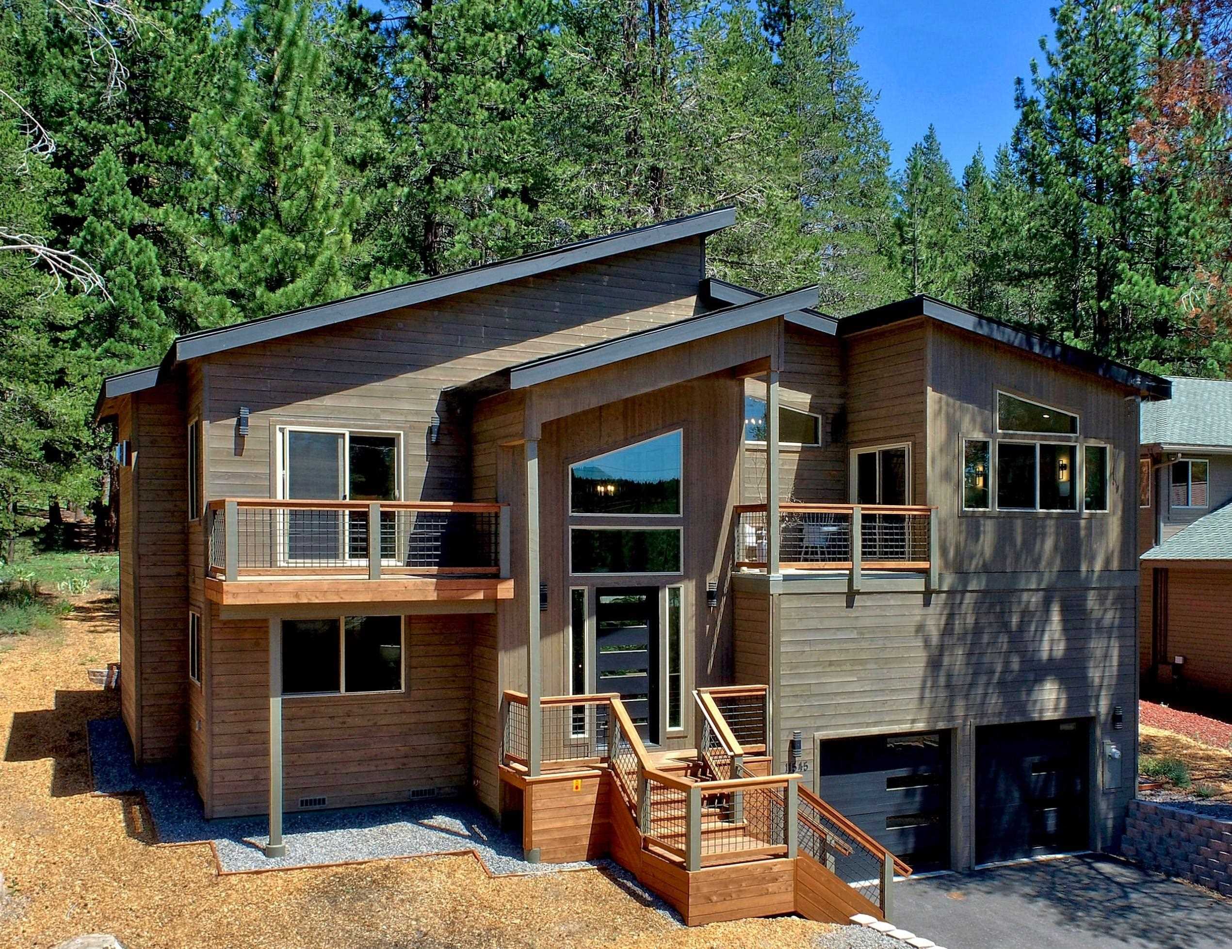11545 Bennett Flat Road Truckee, CA 96161 - Photo 1 of 21 a front view of a house with balcony