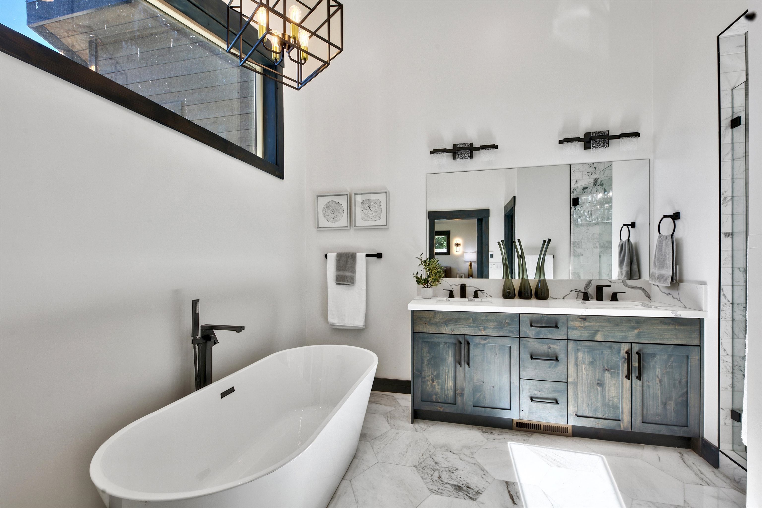 11545 Bennett Flat Road Truckee, CA 96161 - Photo 12 of 21 a spacious bathroom with a bathtub sink and mirror