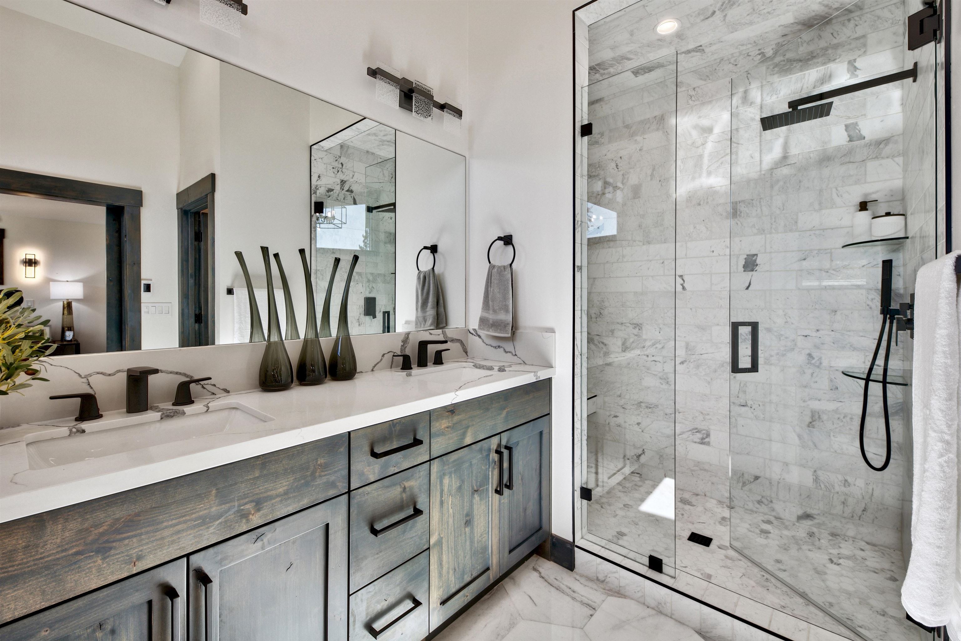 11545 Bennett Flat Road Truckee, CA 96161 - Photo 13 of 21 a bathroom with a double vanity sink toilet and shower