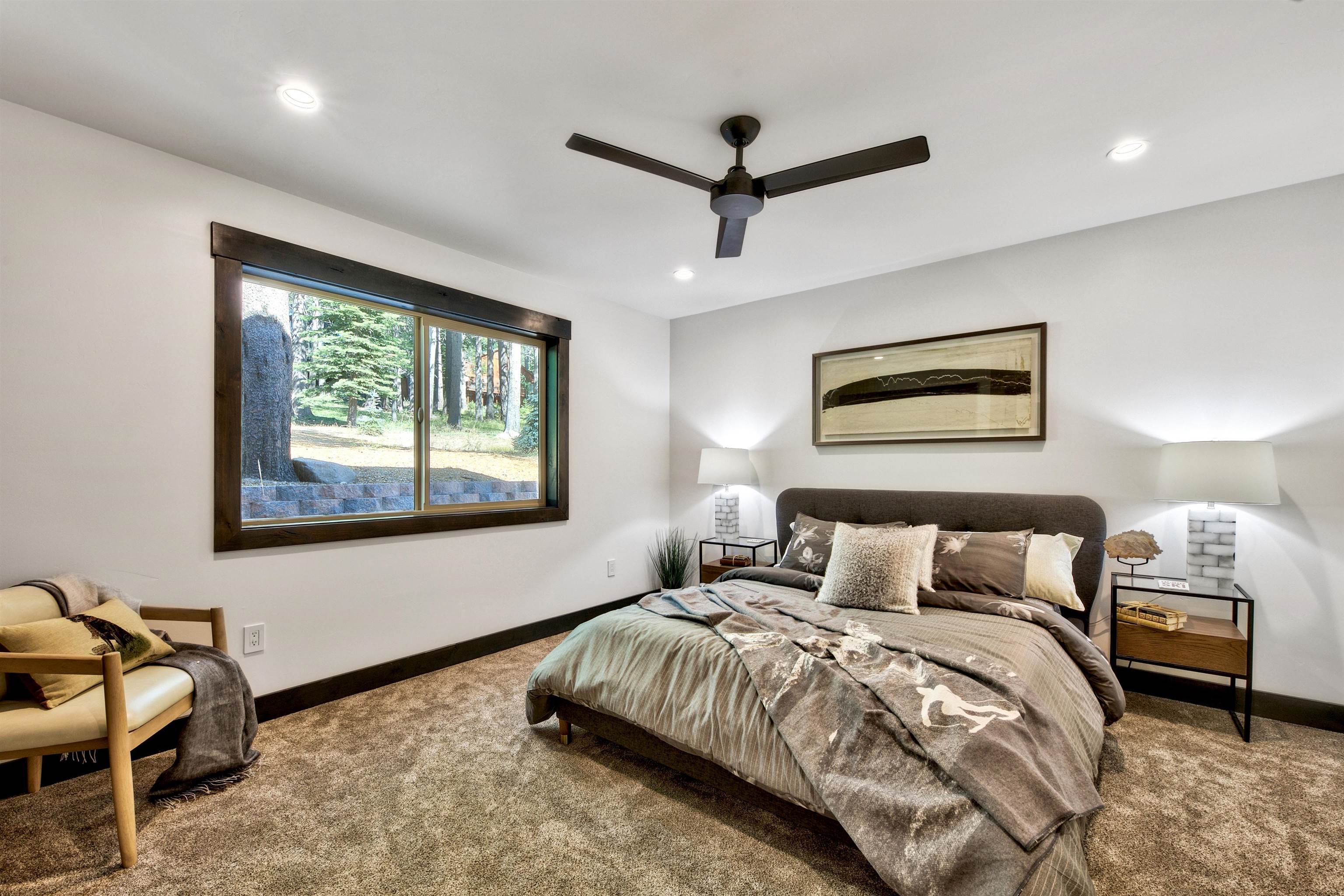 11545 Bennett Flat Road Truckee, CA 96161 - Photo 14 of 21 a bedroom with a bed and a painting on the wall