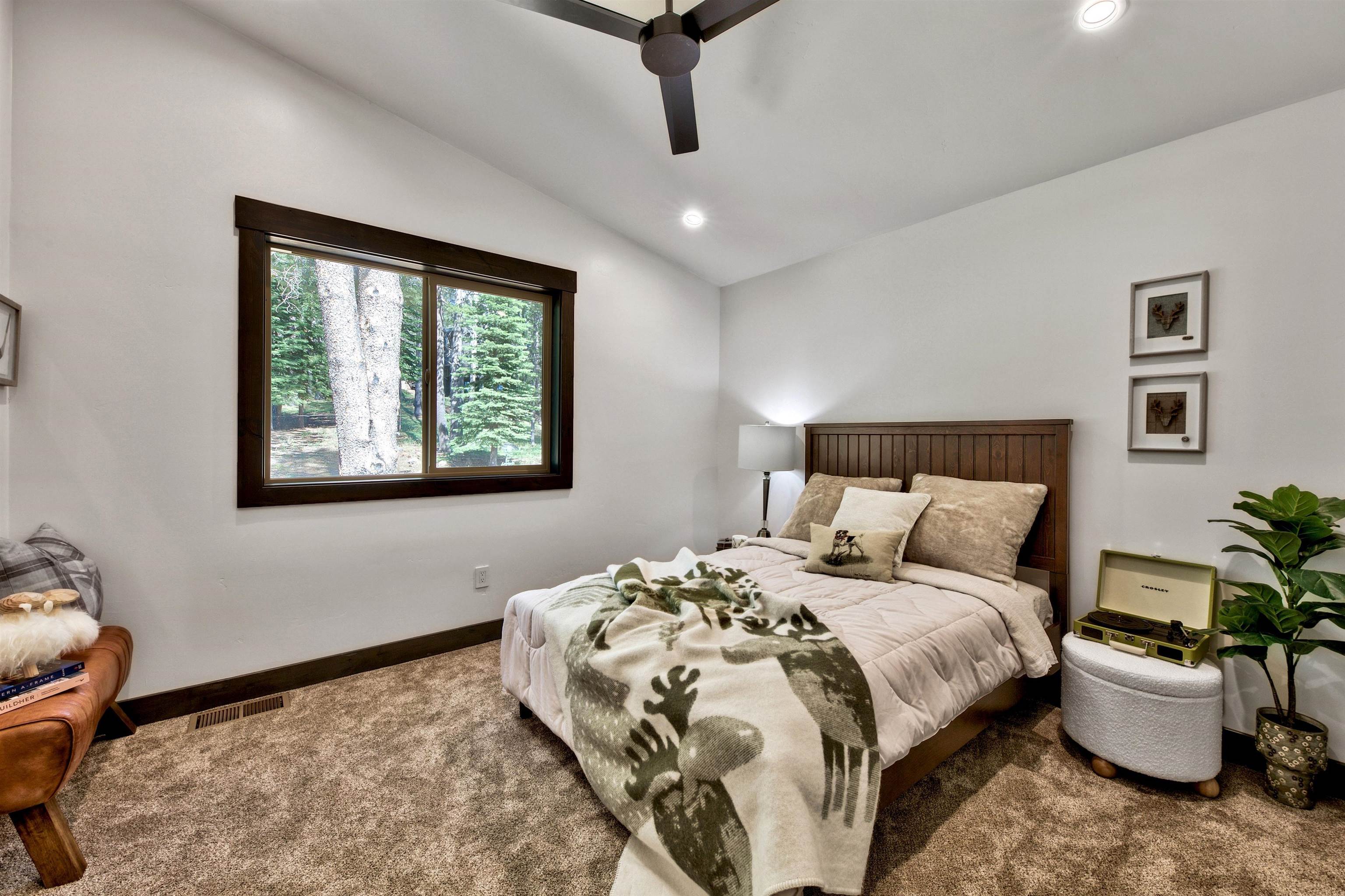 11545 Bennett Flat Road Truckee, CA 96161 - Photo 16 of 21 a bedroom with a bed and window