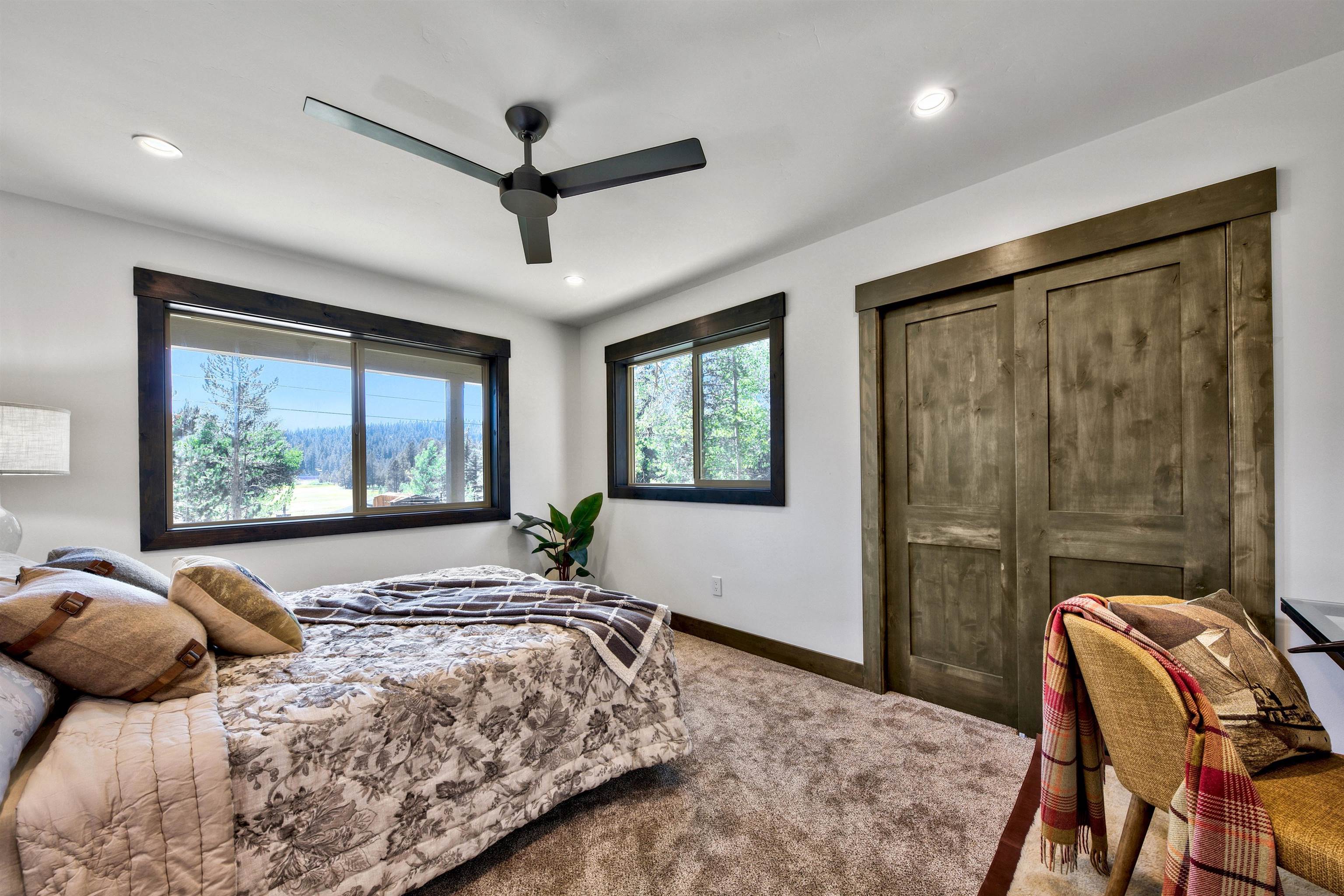 11545 Bennett Flat Road Truckee, CA 96161 - Photo 18 of 21 a bedroom with a bed and window