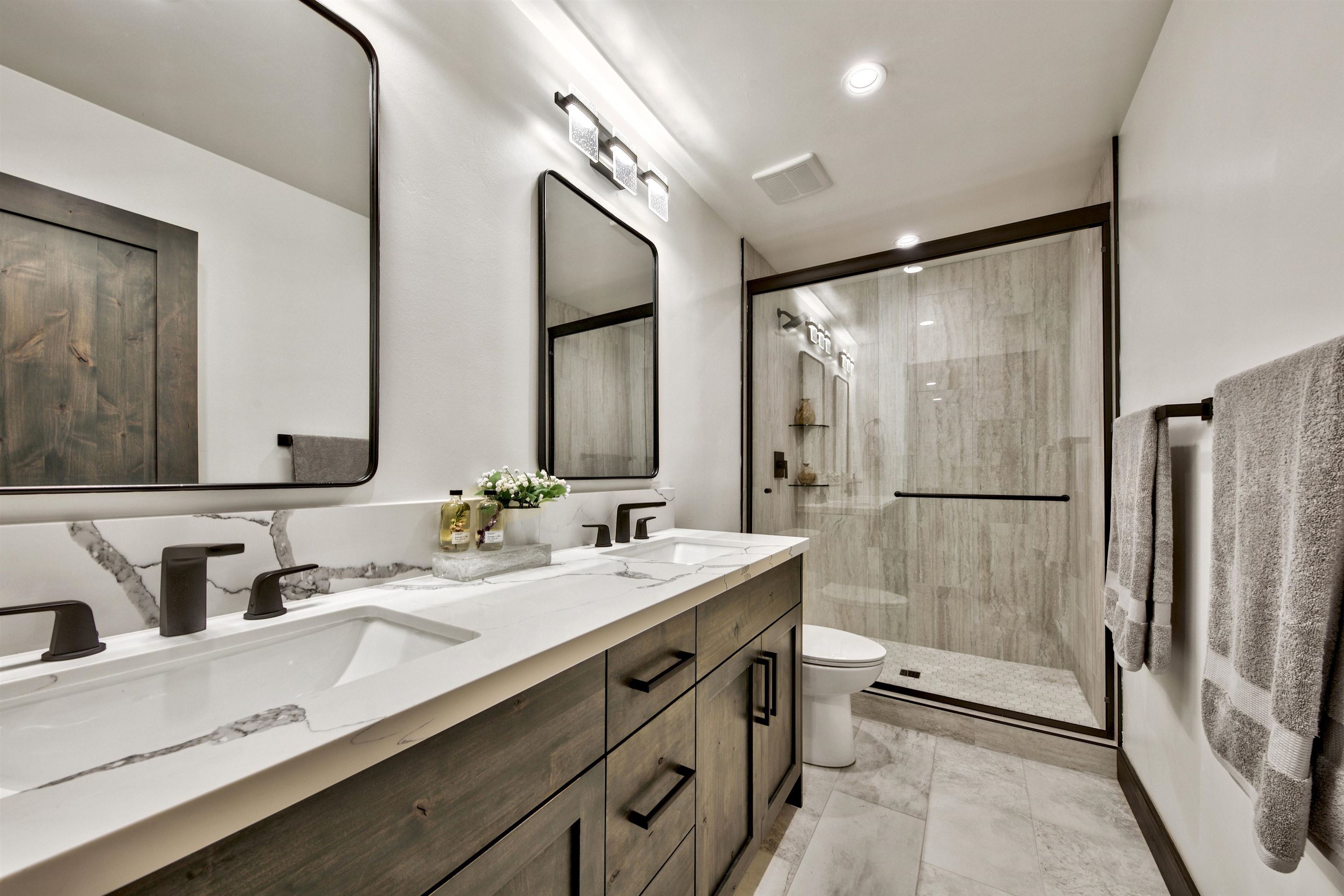 11545 Bennett Flat Road Truckee, CA 96161 - Photo 19 of 21 a bathroom with a double vanity sink mirror double and shower