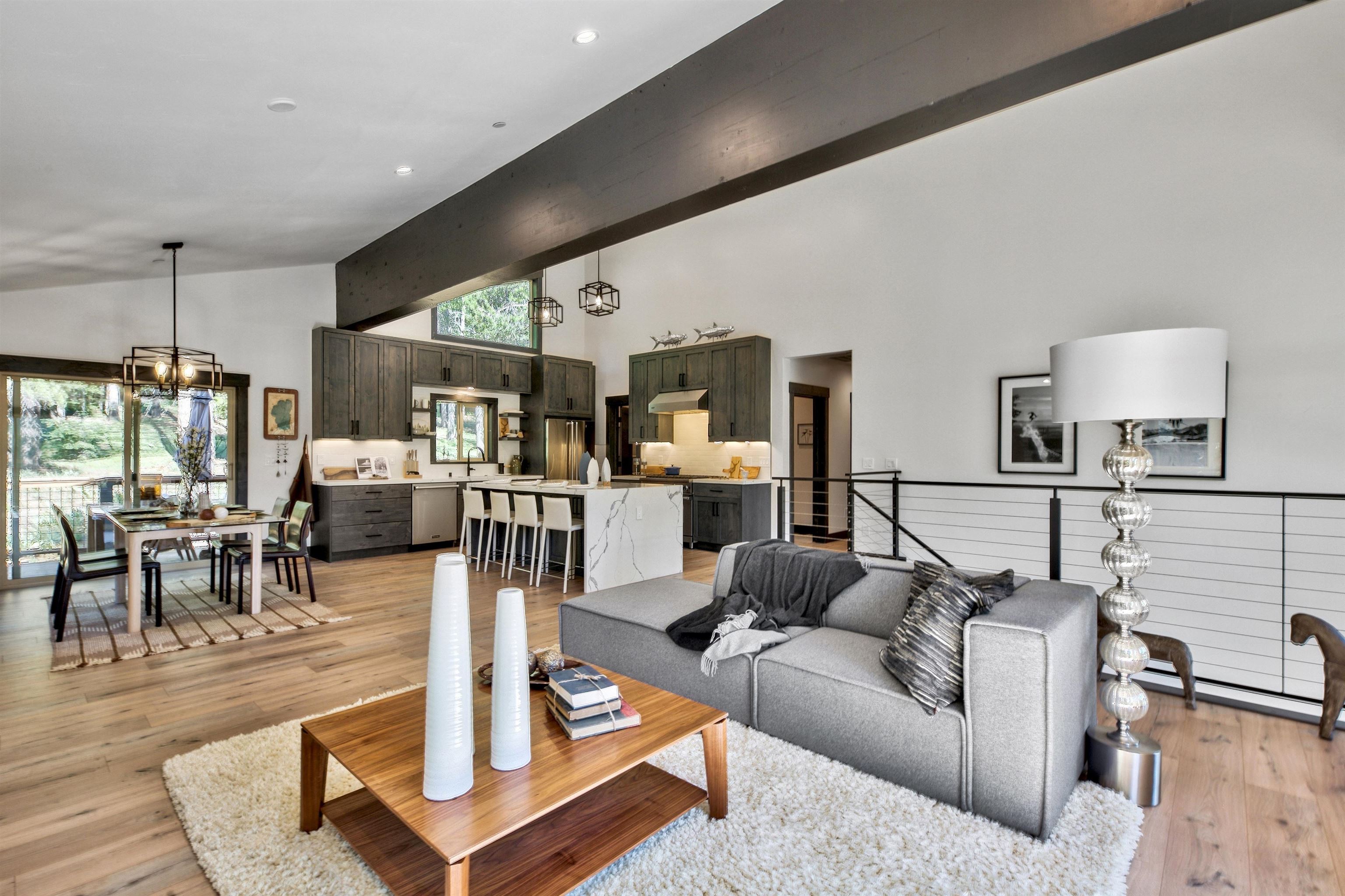 11545 Bennett Flat Road Truckee, CA 96161 - Photo 5 of 21 a living room with furniture a table and kitchen view