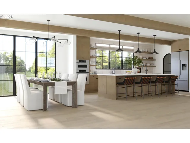 a living room with furniture a chandelier and a large window