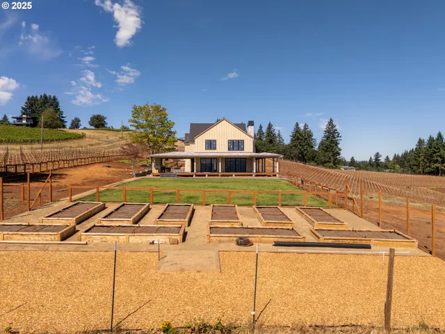 a view of a swimming pool with a yard