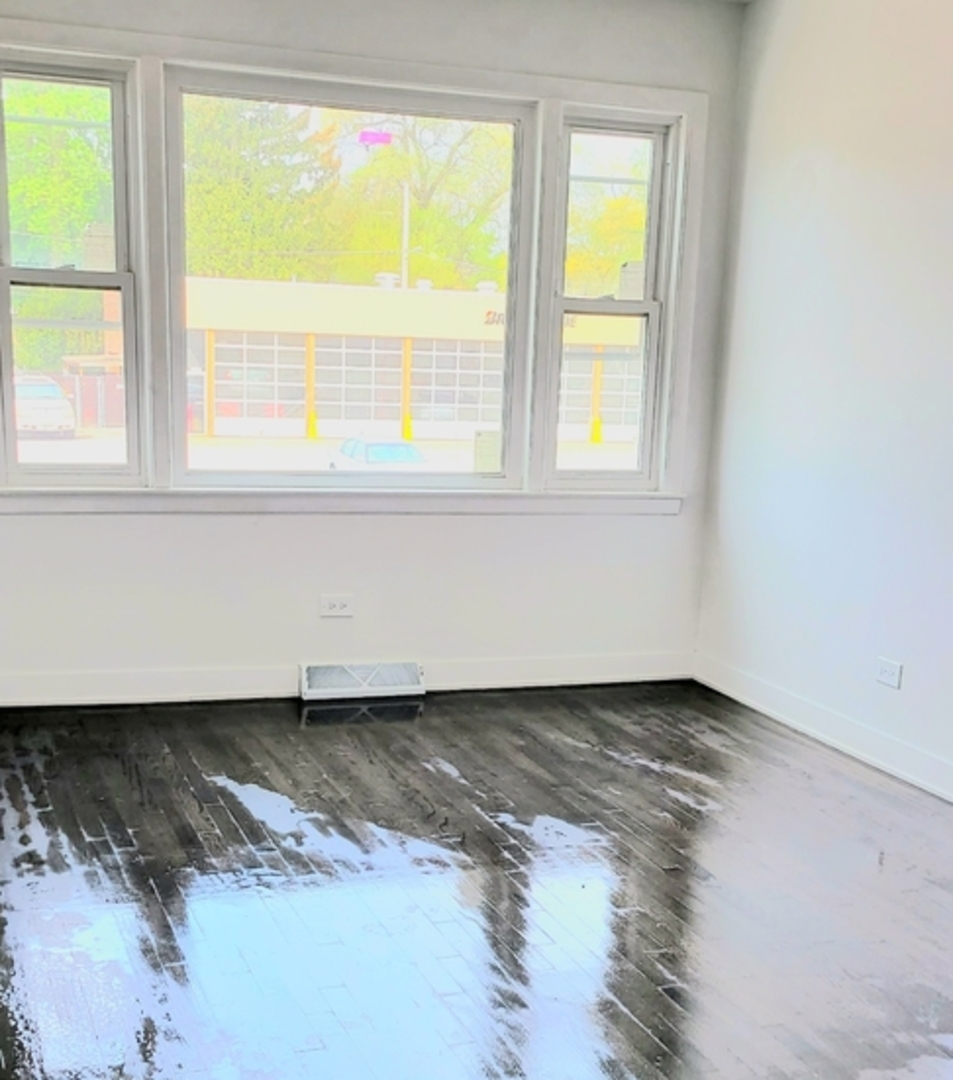 14751 Pulaski Road Midlothian, IL 60445 - Photo 4 of 18 a view of an empty room with a window